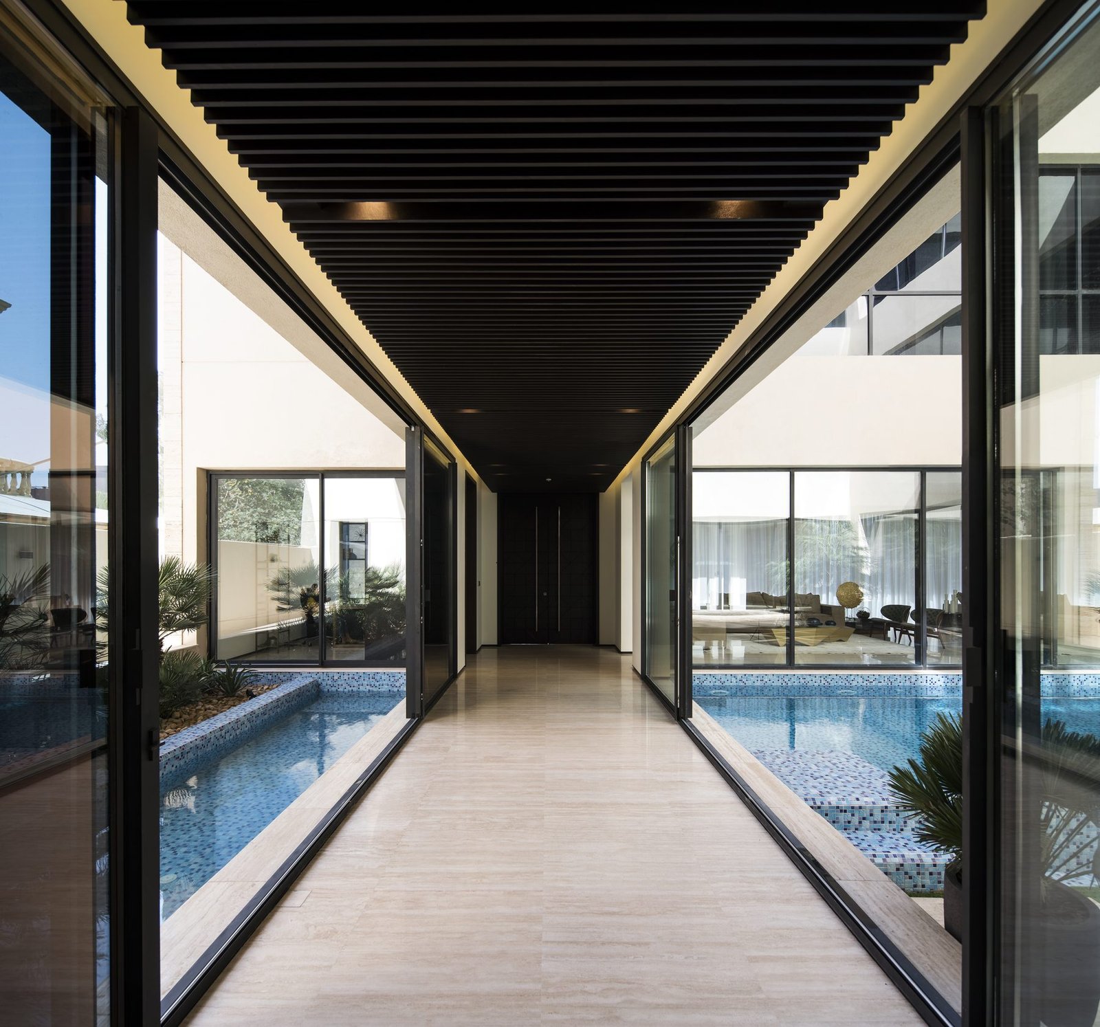Bespoke architectural stonework with sculptural curves and warm natural tones